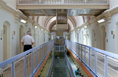 Nearly 40 inmates were incorrectly freed from prisons in England and Wales under a new early release scheme designed to ease overcrowding. Five remain at large, and one committed a new sex crime.