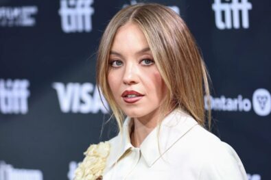 Sydney Sweeney stuns in a sheer silver dress at Power of Women 2025. Read about her emotional speech, the Christy Martin biopic, and her fight for domestic violence awareness.